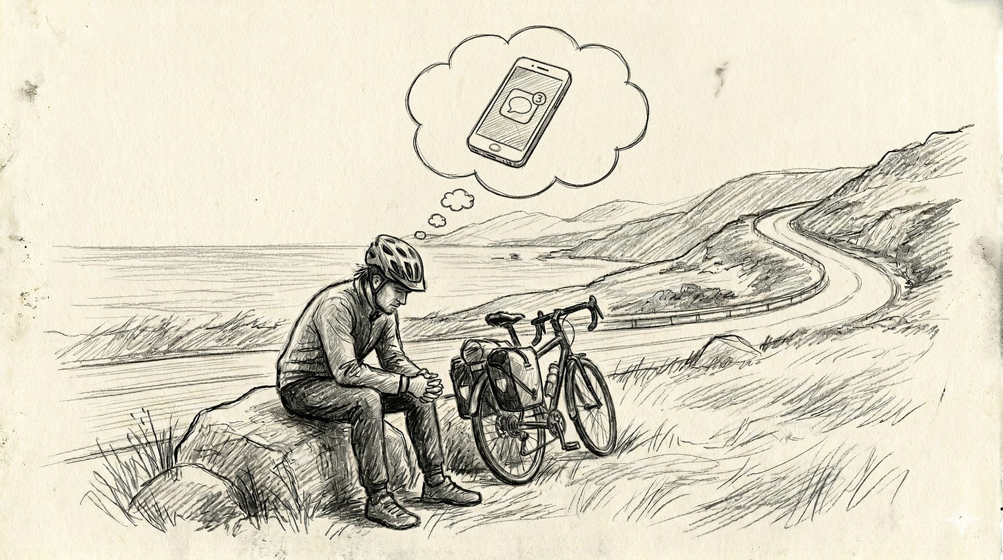 cyclist thinking about his cellphone.
