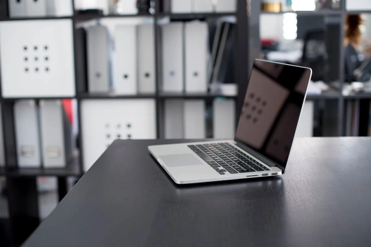 Laptop on a minimalist desk