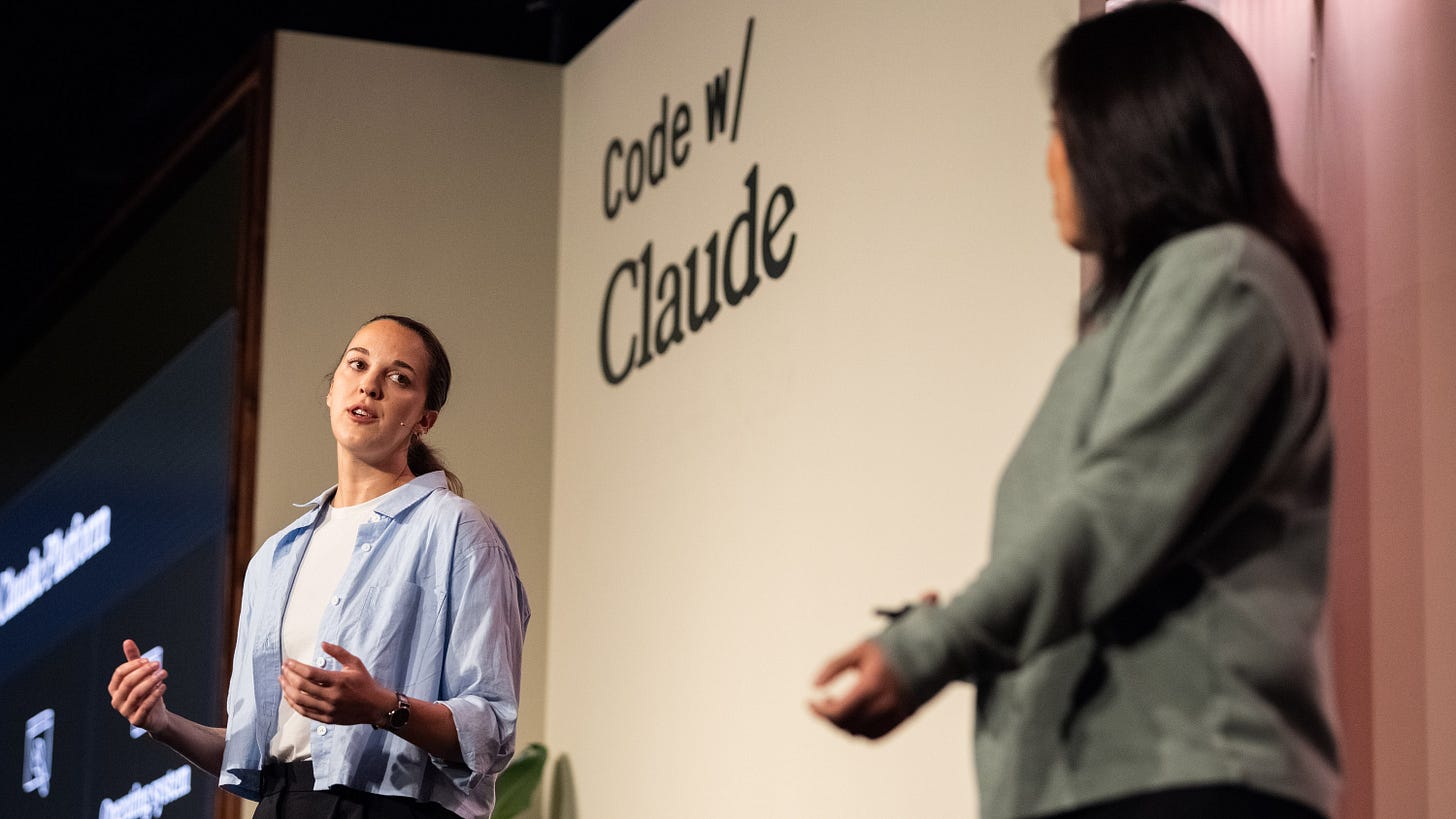 two speakers on stage at the Code with Claude event in London two speakers on stage at the Code with Claude event in London