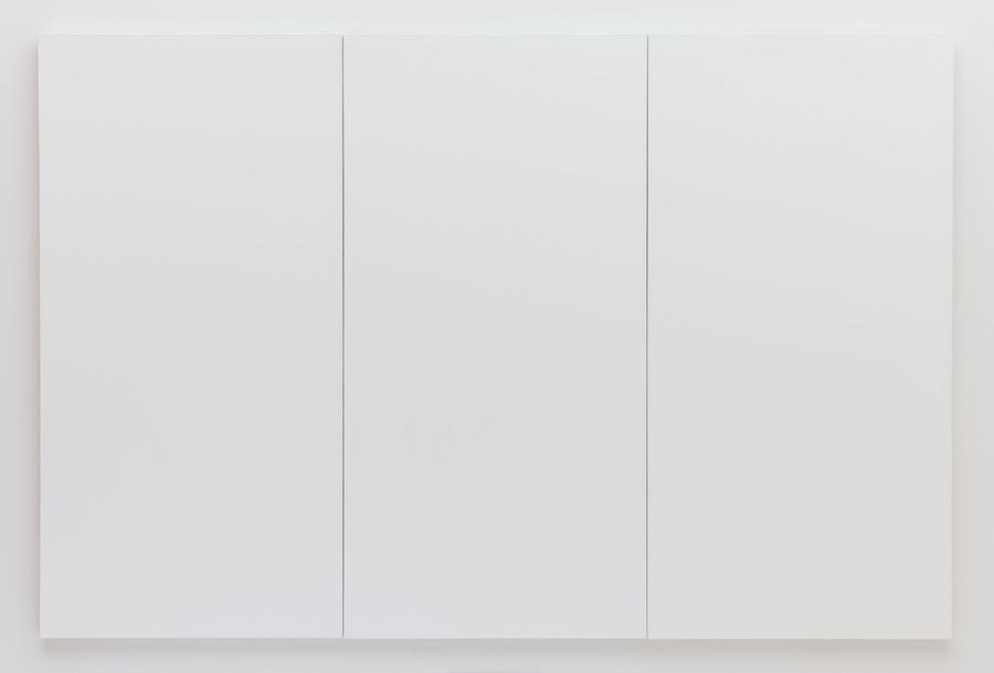 Rauschenberg's White Painting in three panels, plain white rectangles hung side by side on a museum wall Rauschenberg's White Painting in three panels, plain white rectangles hung side by side on a museum wall