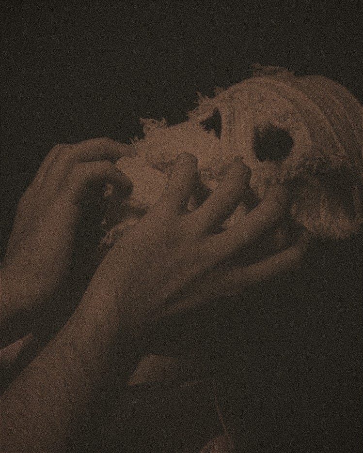 person touching their face