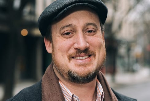 A person wearing a hat

Description automatically generated with low confidence