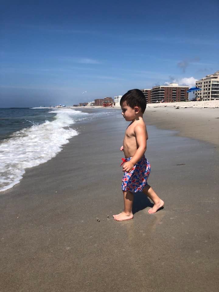 May be an image of 1 person, ocean and beach