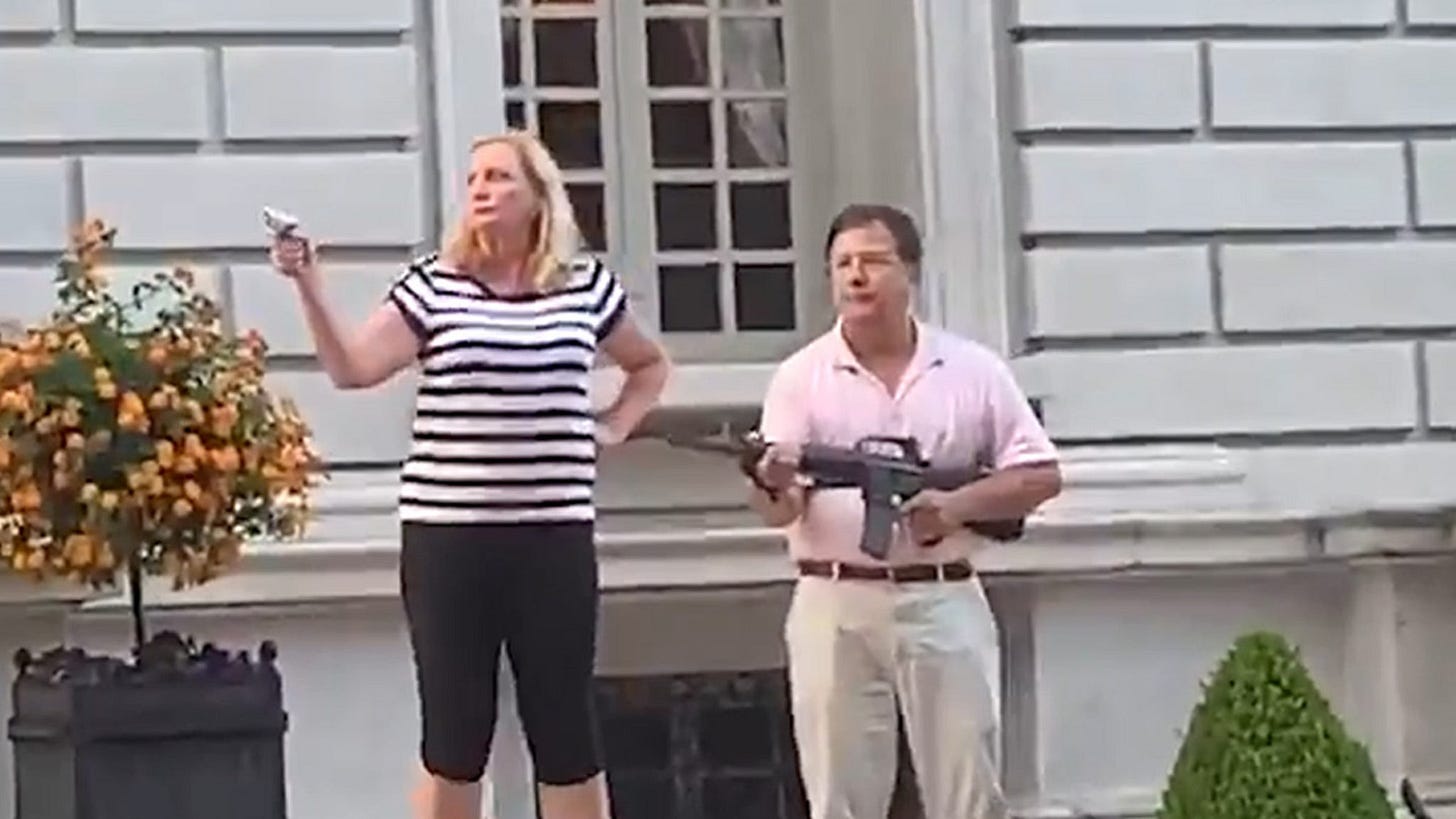 St. Louis Couple Points Guns at Protesters Marching Outside Their Home