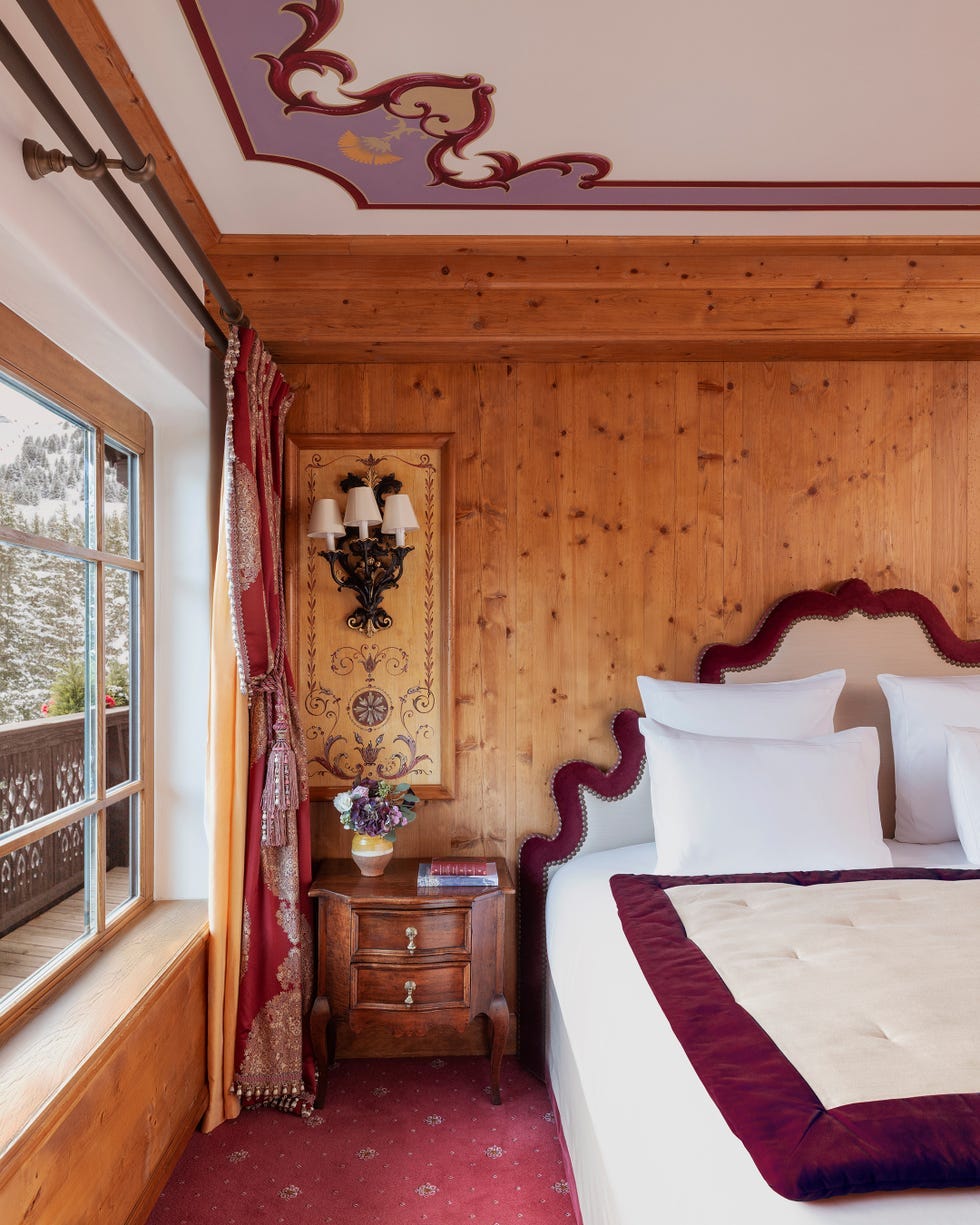 Cozy wooden bedroom with elegant furnishings and decor. Cozy wooden bedroom with elegant furnishings and decor.