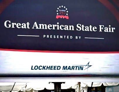 Signs from sponsors Northrop Grumman, GE Aerospace and Lockheed Martin at President Donald Trump's Freedom 250 State Fair on National Mall