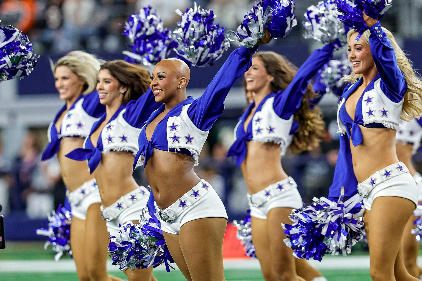 Dallas Cowboys Cheerleader with alopecia performs without a wig