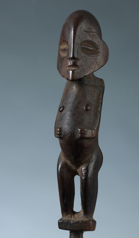 OL000370; Female figure; Circa 1800; Cook Islands Maori; Unknown ; grey background; detail 2 OL000370; Female figure; Circa 1800; Cook Islands Maori; Unknown ; grey background; detail 2