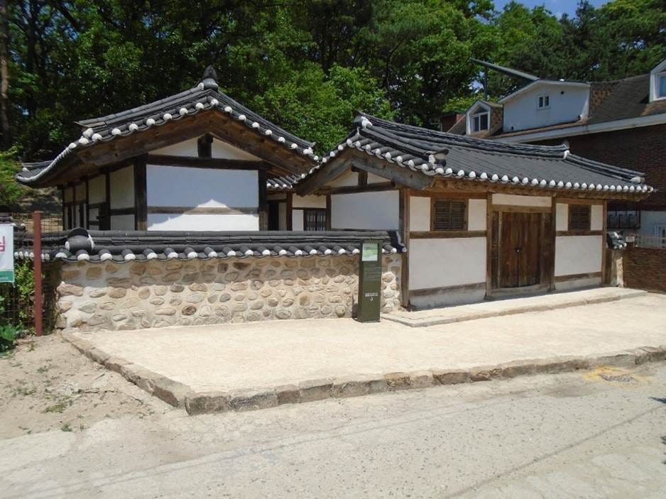 A couple of houses with a stone wall
AI-generated content may be incorrect. A couple of houses with a stone wall
AI-generated content may be incorrect.