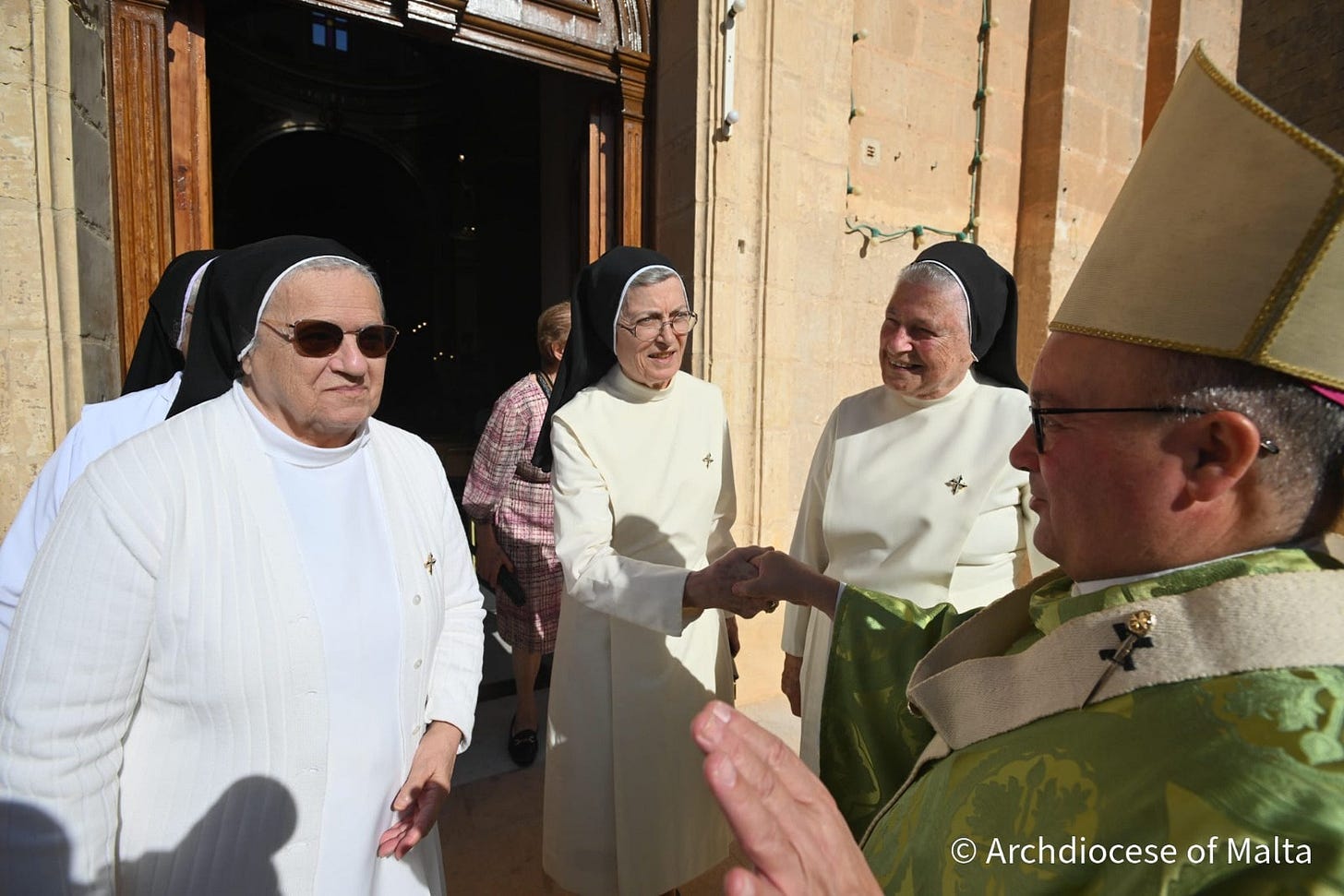 May be an image of one or more people, the Basilica of the National Shrine of the Immaculate Conception and text that says "Archdiocese ArchdioceseofMalta of Malta"