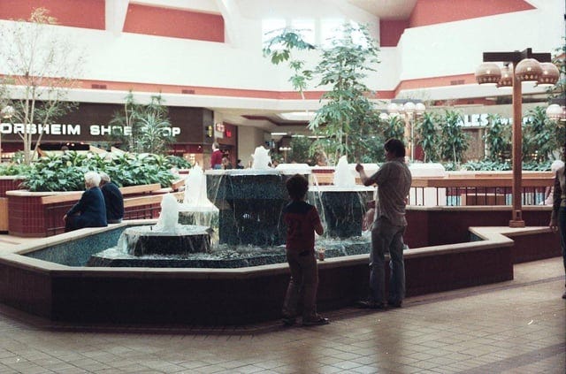 r/nostalgia - My hometown mall fountain in 1980 something! I miss the fountain full of pennies.