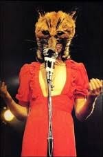 Gabriel in foxes head and red dress during ‘The Musical Box’