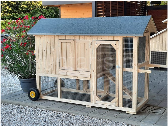 A picture containing building, outdoor, cage, wooden

Description automatically generated