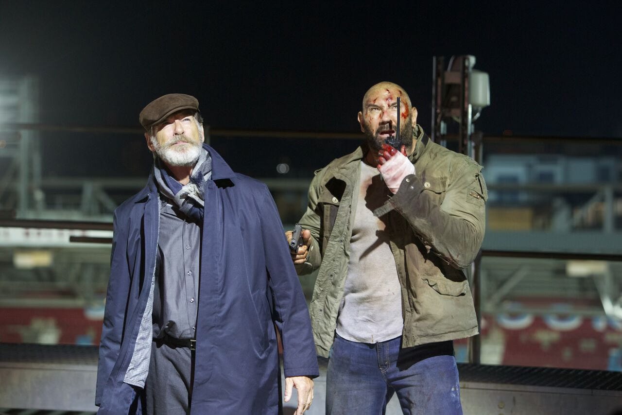 Pierce Brosnan and Dave Bautista atop the Boleyn Ground at Upton park for the 2018 action thriller film Final Score.