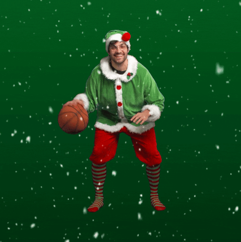A person in a garment holding a basketball

Description automatically generated
