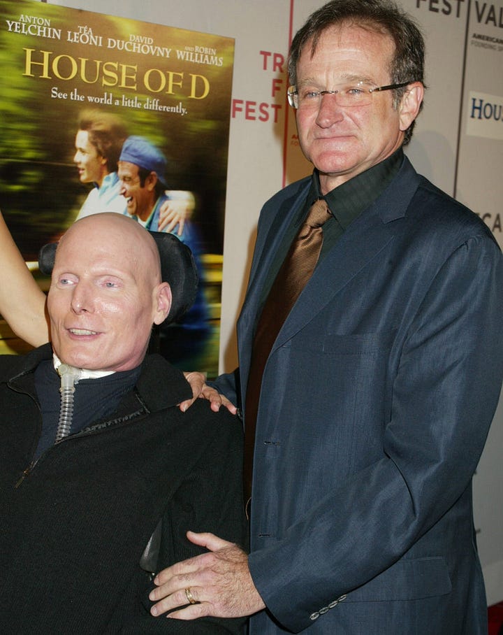 Robin Williams and Christopher Reeve at the House of D premiere during the 2004 Tribeca Film Festival. Nine years after the 1995 horse-riding accident that left Reeve paralyzed from the neck down, Robin remained one of his closest friends and fiercest supporters, helping raise millions for spinal cord injury research through public appearances, advocacy work, and behind-the-scenes generosity.