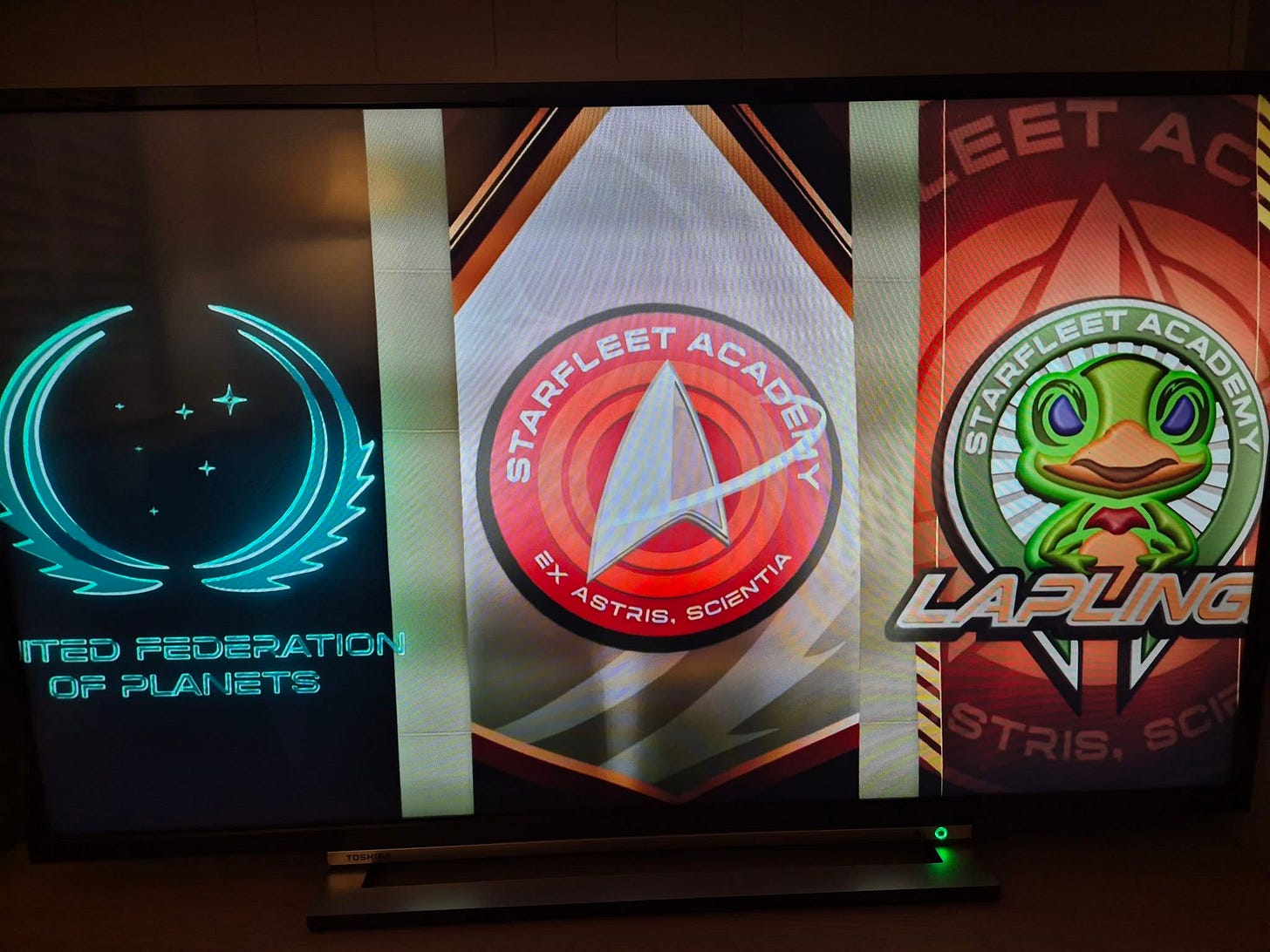 May be an image of text that says 'STARFLEET สูตคร EET AGADENY ACADE STARFL STE-LET ARFLEET ACAD ACAL ΧΞ ASTRIS. SCIENTIA SCIENTIA LAPLING VV ITEDFEDEPATION IED PEDEPATION OF PL AI OFPLANETS ETS I'