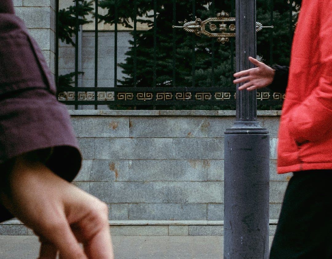 a person holding a cigarette