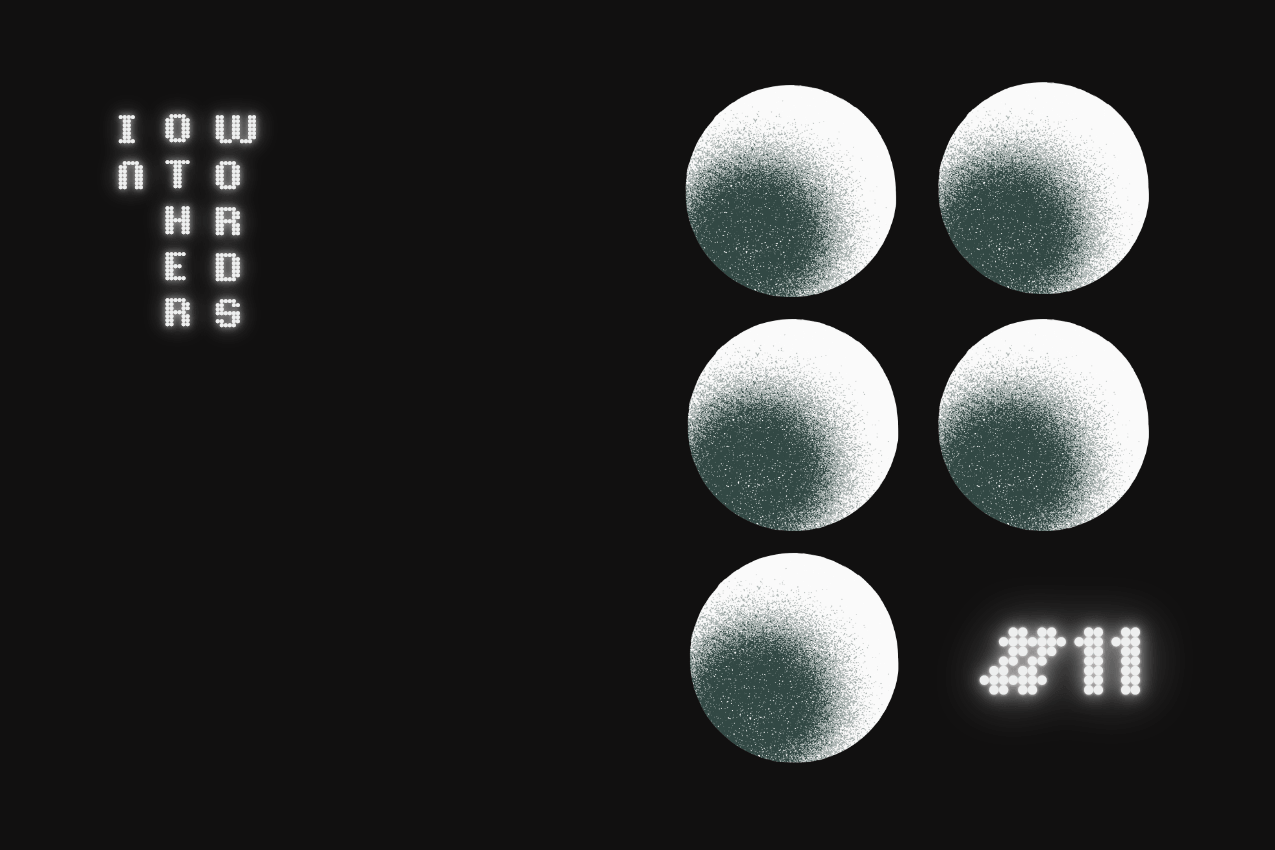 A dark, tactile display terminal emitting a soft phosphor glow. To the left, the text "In Other Words" is stacked into a vertical, computational dot-matrix grid. To the right, a system of five spheres carries a dense, granular stippled gradient texture. In the bottom-right corner, the illumination marks issue #11. Part of the In Other Words series at The Subtext Review.