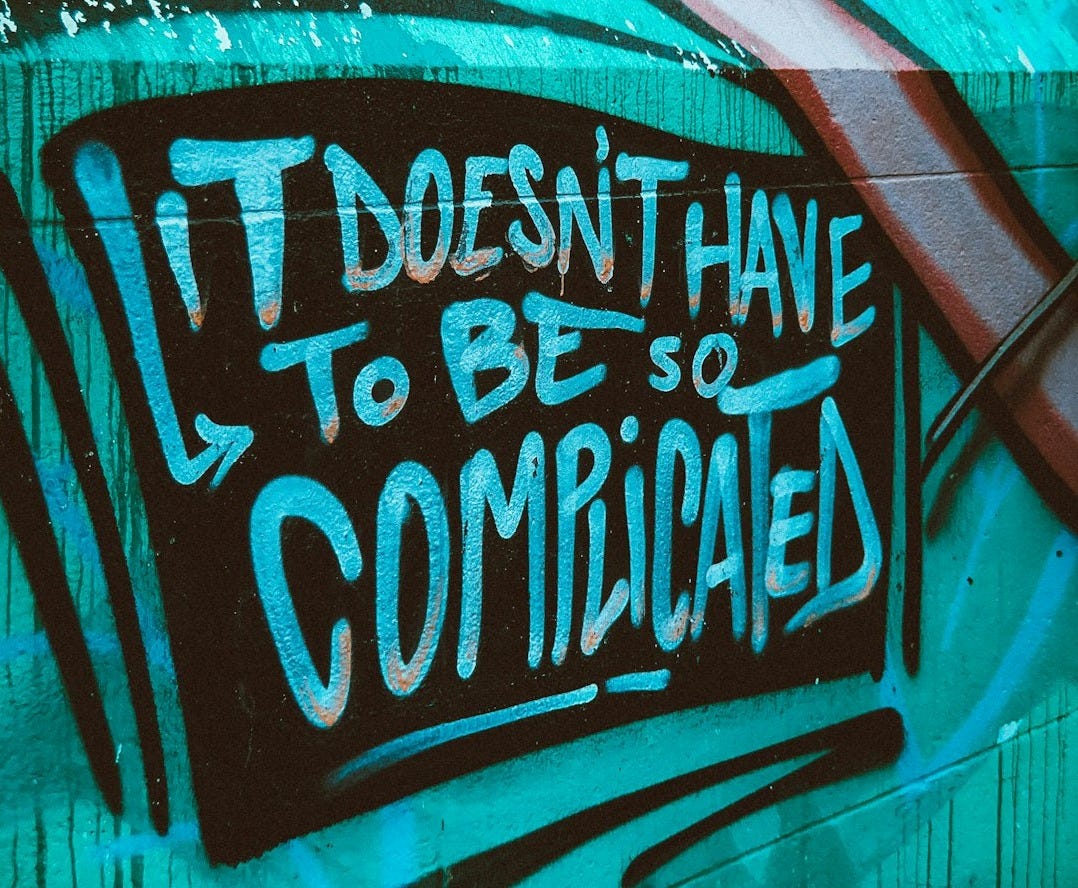 teal and white graffiti wall