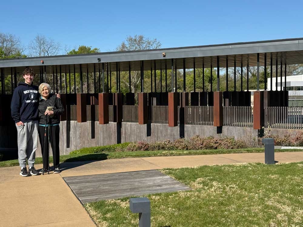 Katharine & her grandson, Asher, at the Legacy Museum memorial in Montgomery, AL. Katharine & her grandson, Asher, at the Legacy Museum memorial in Montgomery, AL.