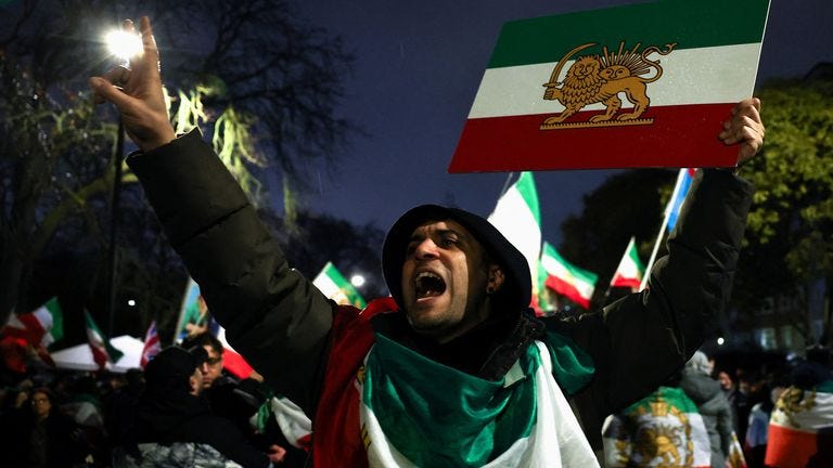 People outside the Iranian embassy in London in support of nationwide protests in Iran. Pic: Reuters