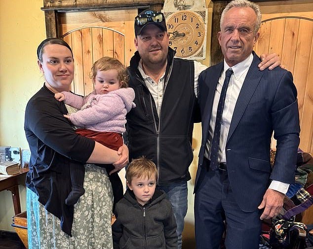 Pictured above is Peter Hildebrand with his wife Eva and two of his children. They met with anti-vaccine crusader RFK Jr, health secretary, after the death of their daughter