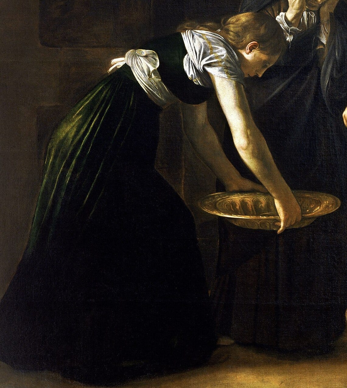 Caravaggio’s The Beheading of Saint John the Baptist, The Maid With the Platter Caravaggio’s The Beheading of Saint John the Baptist, The Maid With the Platter