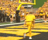a man in a yellow uniform that says ucsd on it a man in a yellow uniform that says ucsd on it