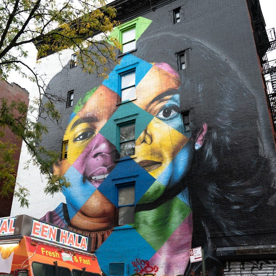 a large mural on a building a large mural on a building