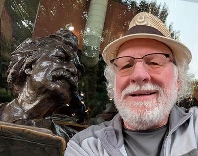 A person wearing a hat and glasses

AI-generated content may be incorrect.