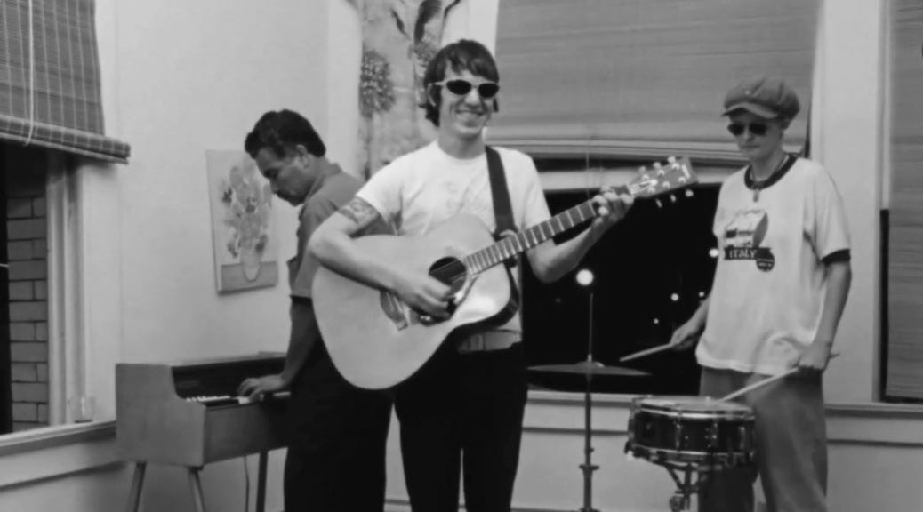 Watch a newly digitized Elliott Smith video: Coming Up Roses | Glorious  Noise