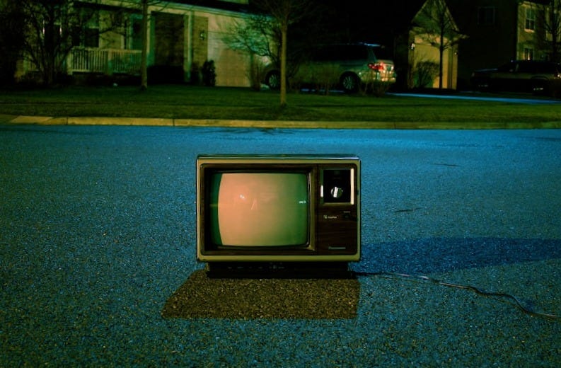 turned off vintage CRT television on road turned off vintage CRT television on road