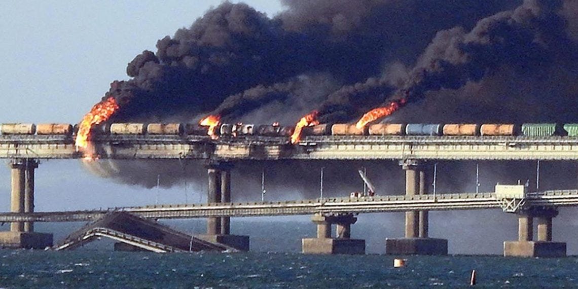 Damage to the bombed bridge connecting Crimea and Russia seen from ...