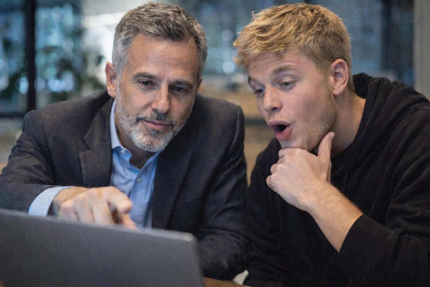 Investor explaining startup assumptions to a founder during a pre-seed discussion Investor explaining startup assumptions to a founder during a pre-seed discussion