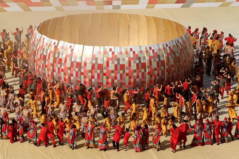 JOHANNESBURG, SOUTH AFRICA - JUNE 11: Performers dance around a representation of the calabash cooking pot which inspired the design of Soccer City Stadium, during the Opening Ceremony ahead of the 2010 FIFA World Cup South Africa Group A match between South Africa and Mexico at Soccer City Stadium on June 11, 2010 in Johannesburg, South Africa. (Photo by David Cannon/Getty Images) JOHANNESBURG, SOUTH AFRICA - JUNE 11: Performers dance around a representation of the calabash cooking pot which inspired the design of Soccer City Stadium, during the Opening Ceremony ahead of the 2010 FIFA World Cup South Africa Group A match between South Africa and Mexico at Soccer City Stadium on June 11, 2010 in Johannesburg, South Africa. (Photo by David Cannon/Getty Images)