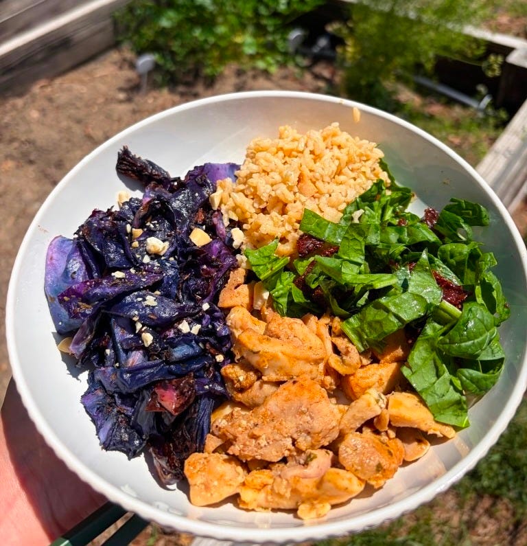 a colorful plate with charred cabbage, brown bone broth rice, sun-dried tomato salad, and grilled chicken a colorful plate with charred cabbage, brown bone broth rice, sun-dried tomato salad, and grilled chicken