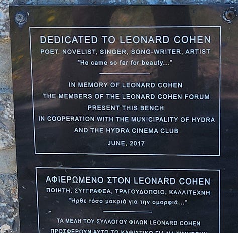 Collage of three images from Hydra, Greece: a plaque mounted on stone dedicating a park bench to Leonard Cohen, a close-up of the plaque with bilingual text in English and Greek, and a pale green front door believed to be Cohen’s home, framed by whitewashed walls and a tree.