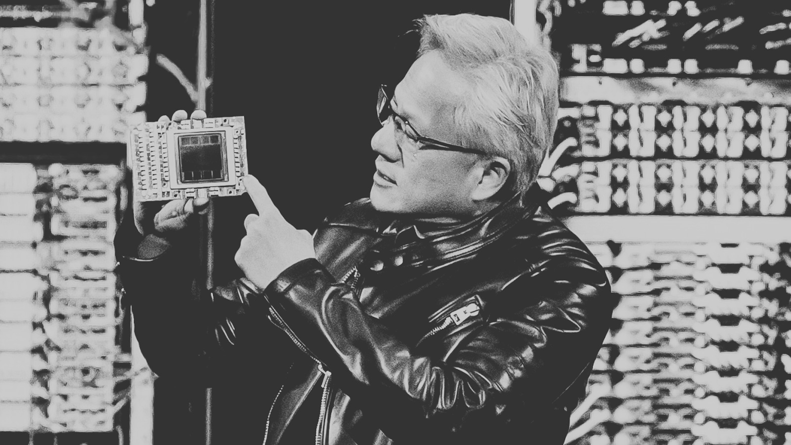 NVIDIA CEO Jensen Huang shows the Blackwell chip, March 2024