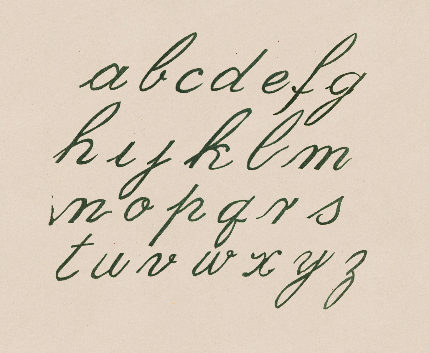 Green velvet-flocked script alphabet on cream cardstock