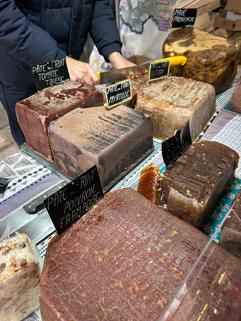 Six photos from life in France--colorful peonies, French butcher shop specialties, an Easter table with a pretty French quiche