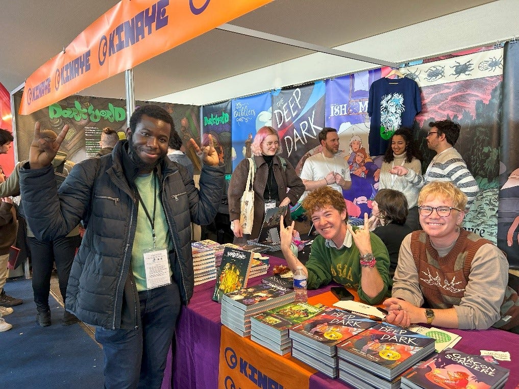 A group of people at a booth

AI-generated content may be incorrect.