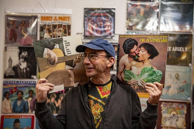 Steve Goldman with his record collection of the Worst Album Covers as he exhibits them at Piazza Shopping Centre in, Huddersfield. Picture Tony Johnson