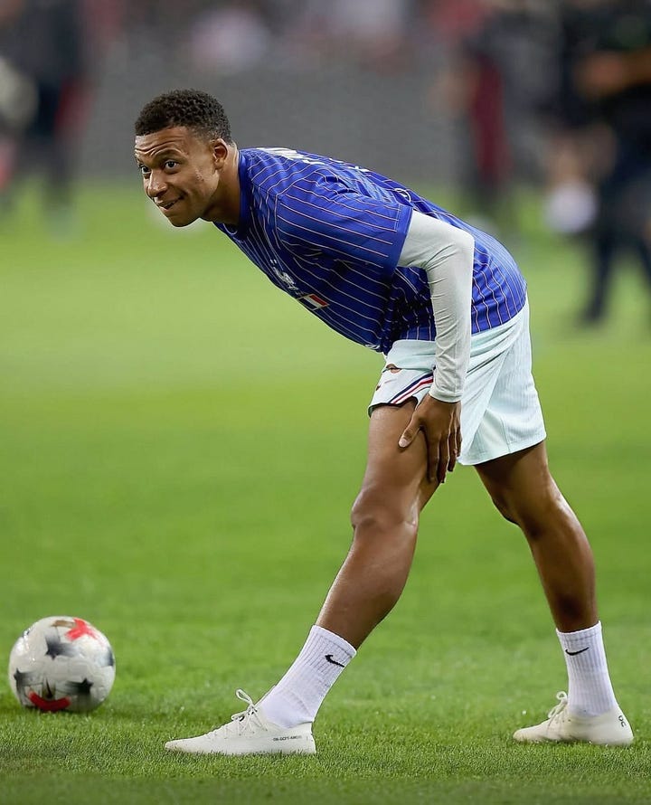 Kylian Mbappé warming up for France in white On LightSpray prototype boots marked ON-DCPT-KM010, and a close-up of the On logo on the boot's heel
