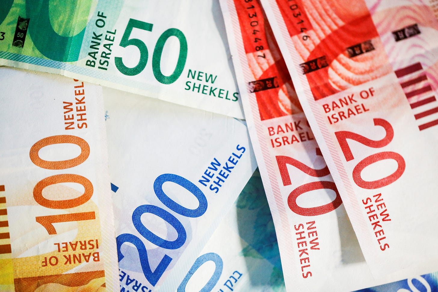 Israel sells record $8 billion in bonds despite Oct 7 attacks, downgrade |  Reuters