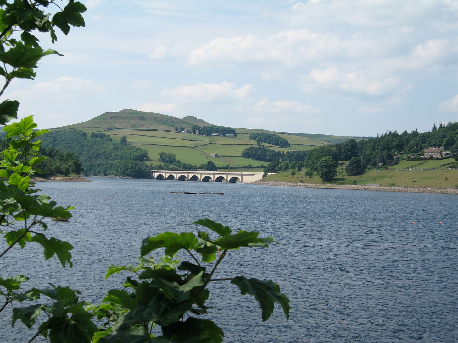 Ladybower Reservoir Derbyshire . At the bottom of the reservoir lie the remains of the villages of Ashopton and Derwent, destroyed to make way for Ladybower Reservoir. Ladybower Reservoir Derbyshire . At the bottom of the reservoir lie the remains of the villages of Ashopton and Derwent, destroyed to make way for Ladybower Reservoir.