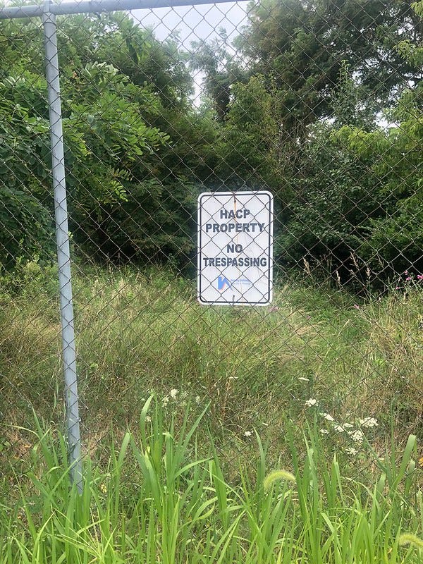 Housing Authority no trespassing sign.