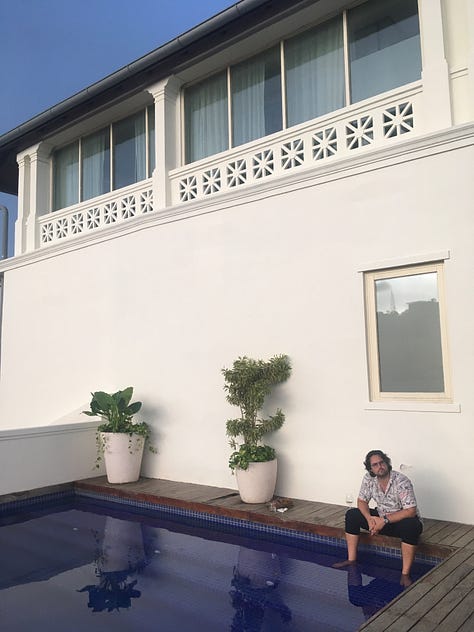 Rooftop pool, interior courtyard from top floor, detail of lobby tile.