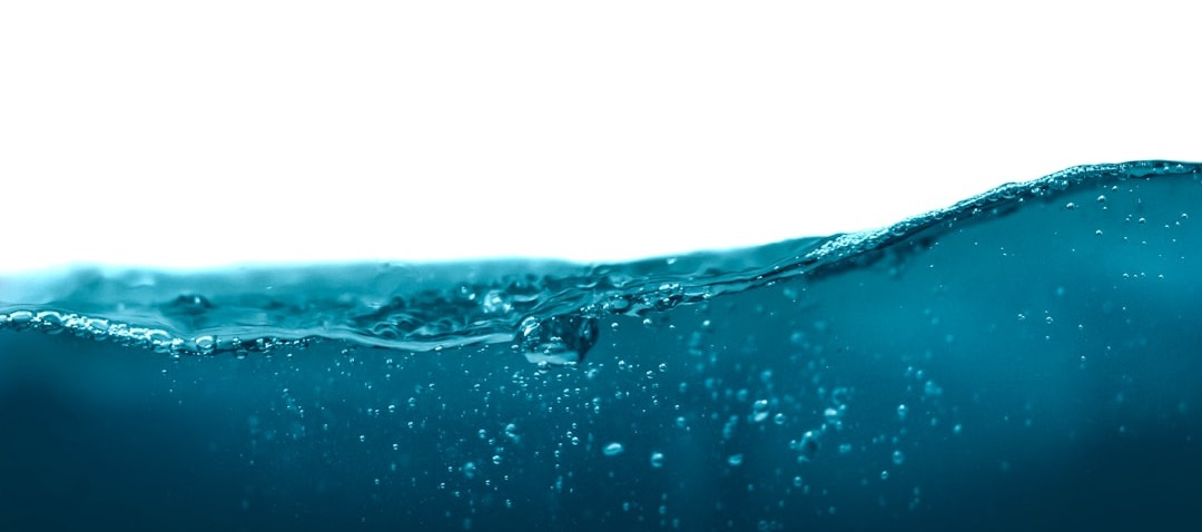 water drops on blue surface