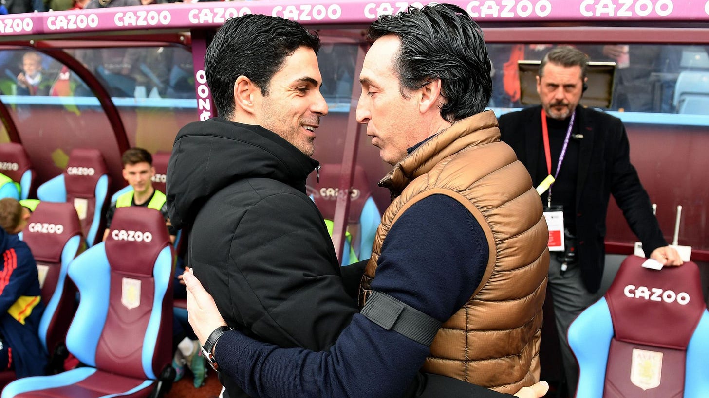 Mikel Arteta and Unai Emery embrace